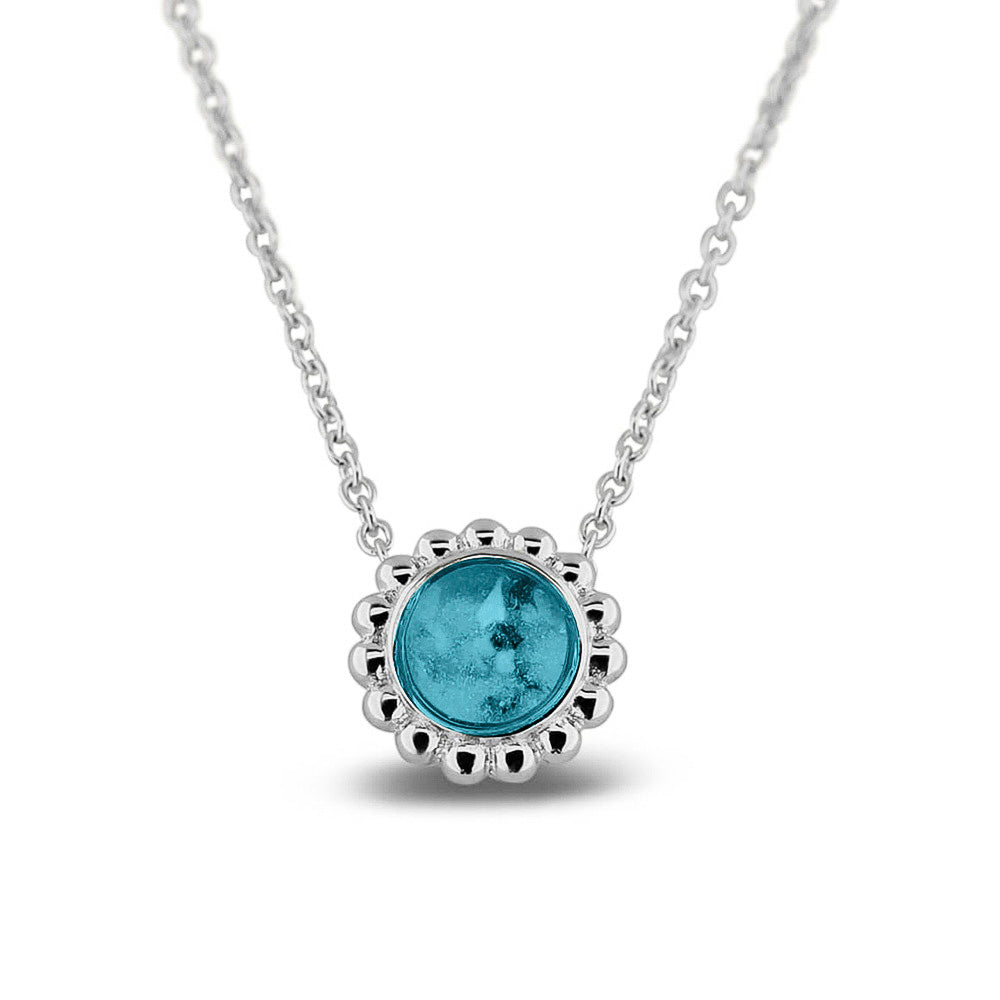 Ashanger, gedenksieraad, waar as en haar in verwerkt wordt. Turquoise