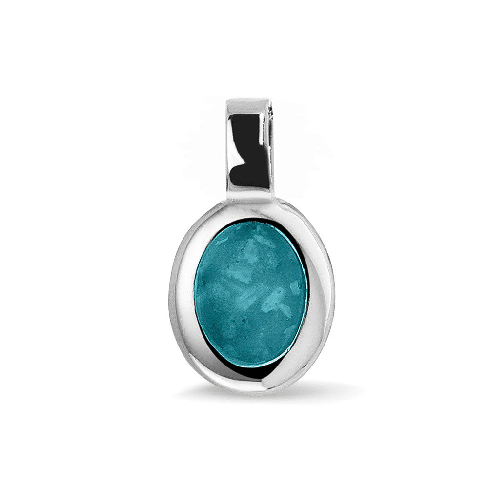 Ovale platte ashanger, gedenksieraad, waar as en haar in verwerkt wordt. Turquoise