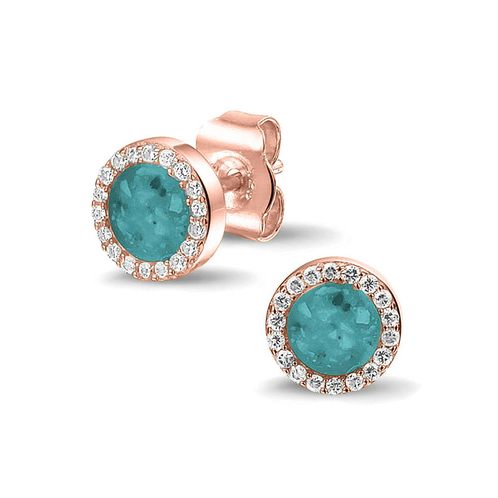 Oorstekers 8 mm rondom afgewerkt met zirkonia's zichtbaar gevuld met as of haar. Aqua