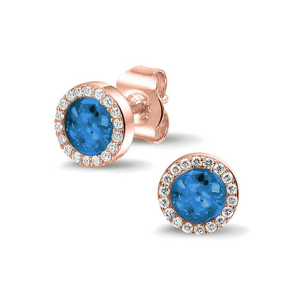 Oorstekers 8 mm rondom afgewerkt met zirkonia's zichtbaar gevuld met as of haar. Marine