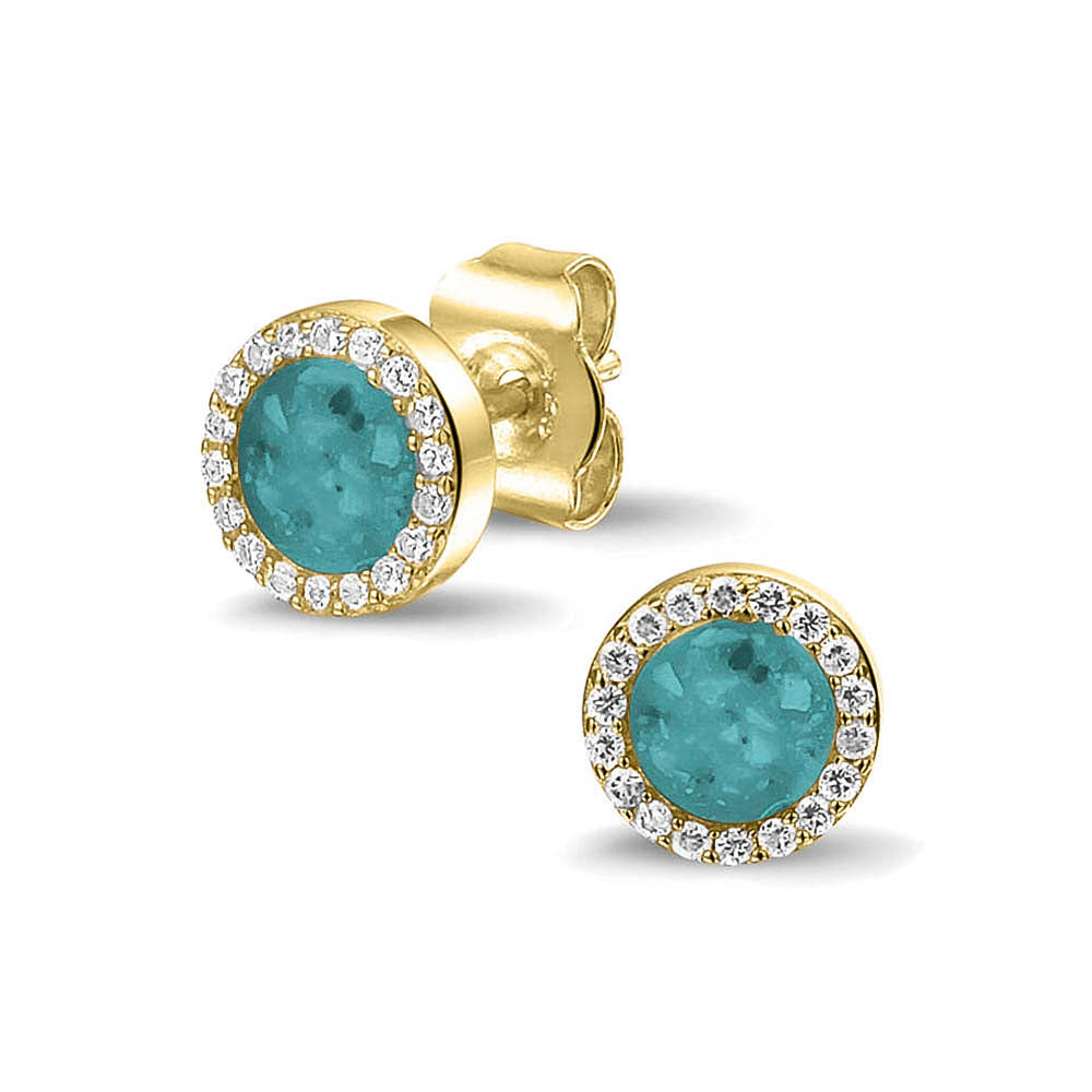 Oorstekers 8 mm rondom afgewerkt met zirkonia's zichtbaar gevuld met as of haar. Aqua