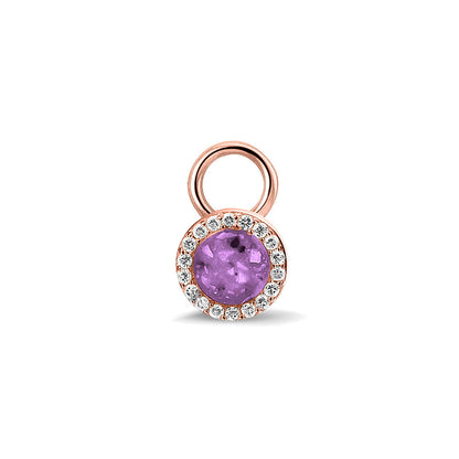 Oorhangers 8 mm diameter, rondom afgewerkt met zirkonia's, aan de voorzijde zichtbaar gevuld met as of haar. Purple