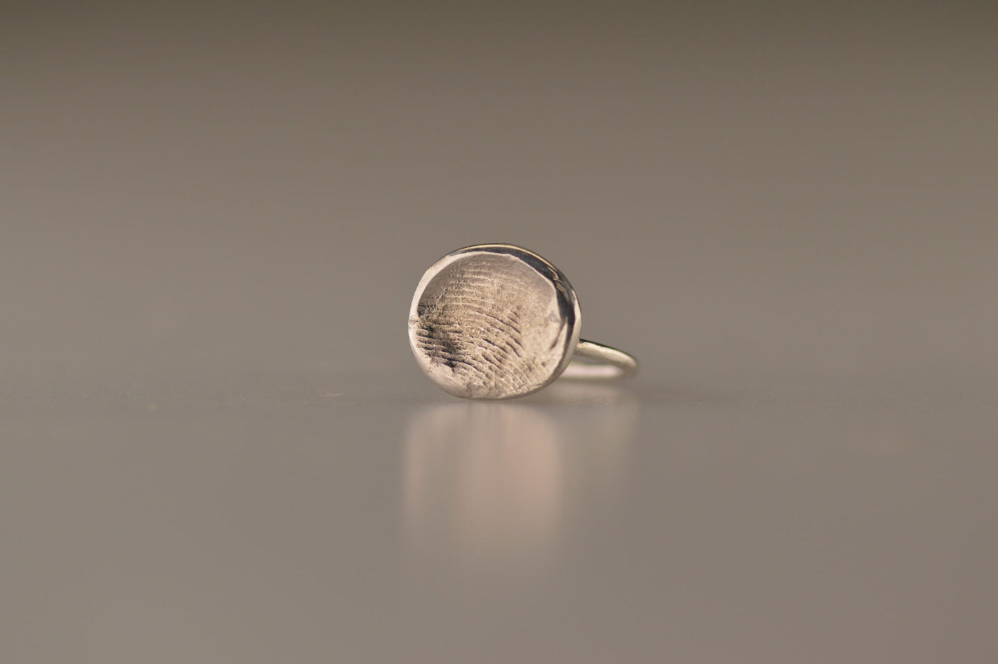 Ring met vingerafdruk