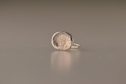 Ring met vingerafdruk