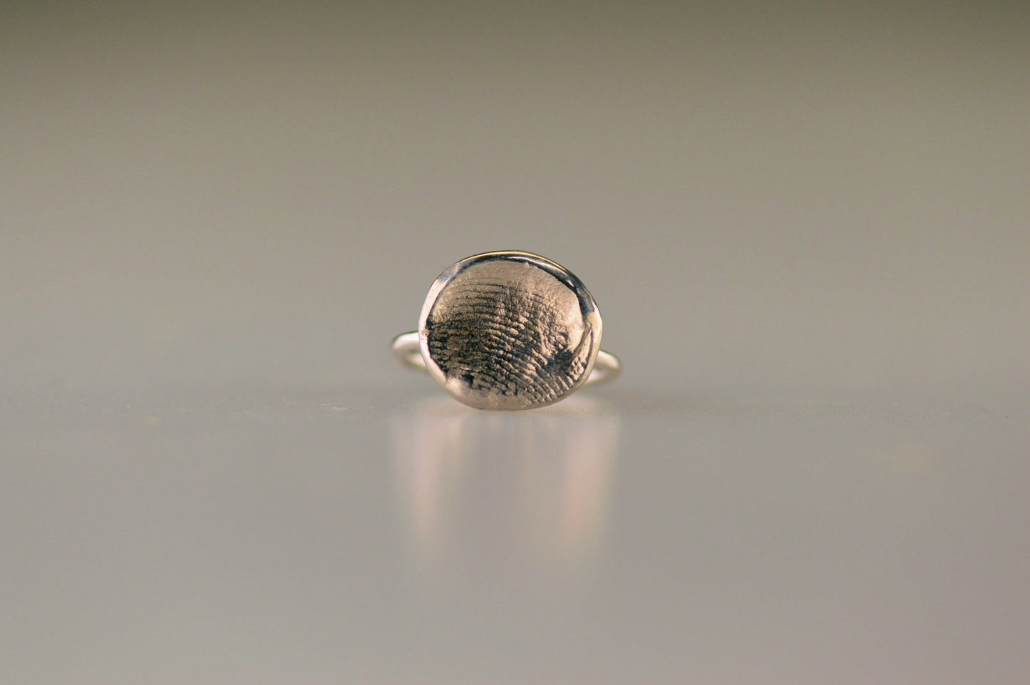 Ring met vingerafdruk