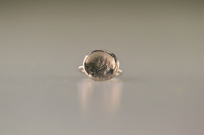 Ring met vingerafdruk