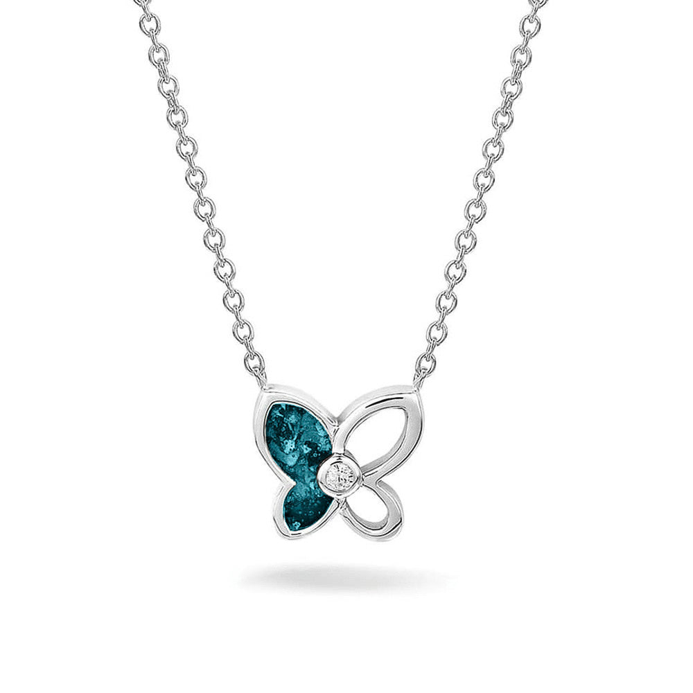 Ashanger vlinder, gedenksieraad, waar as en haar in verwerkt wordt. Turquoise