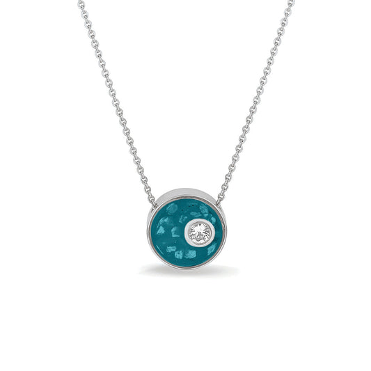 Ashanger rond, gedenksieraad, waar as en haar in verwerkt wordt. Turquoise