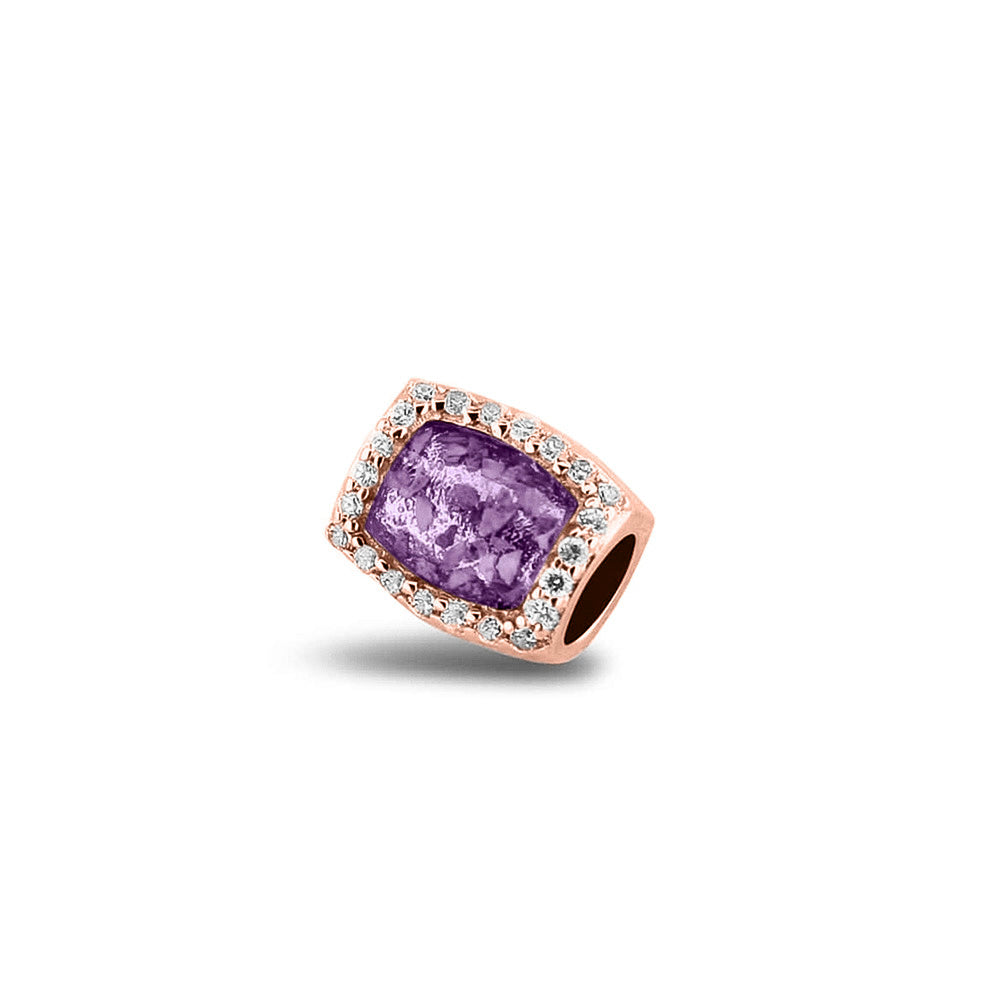 Asbedel rondom afgewerkt met zirkonia's die aan beide zijdes in twee compartimenten zichtbaar gevuld wordt met as of haar. Purple