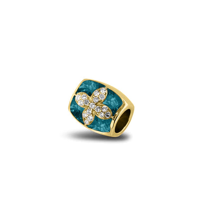 Asbedel met  zirkonia's, aan beide zijdes in twee compartimenten zichtbaar gevuld met as of haar. Turquoise