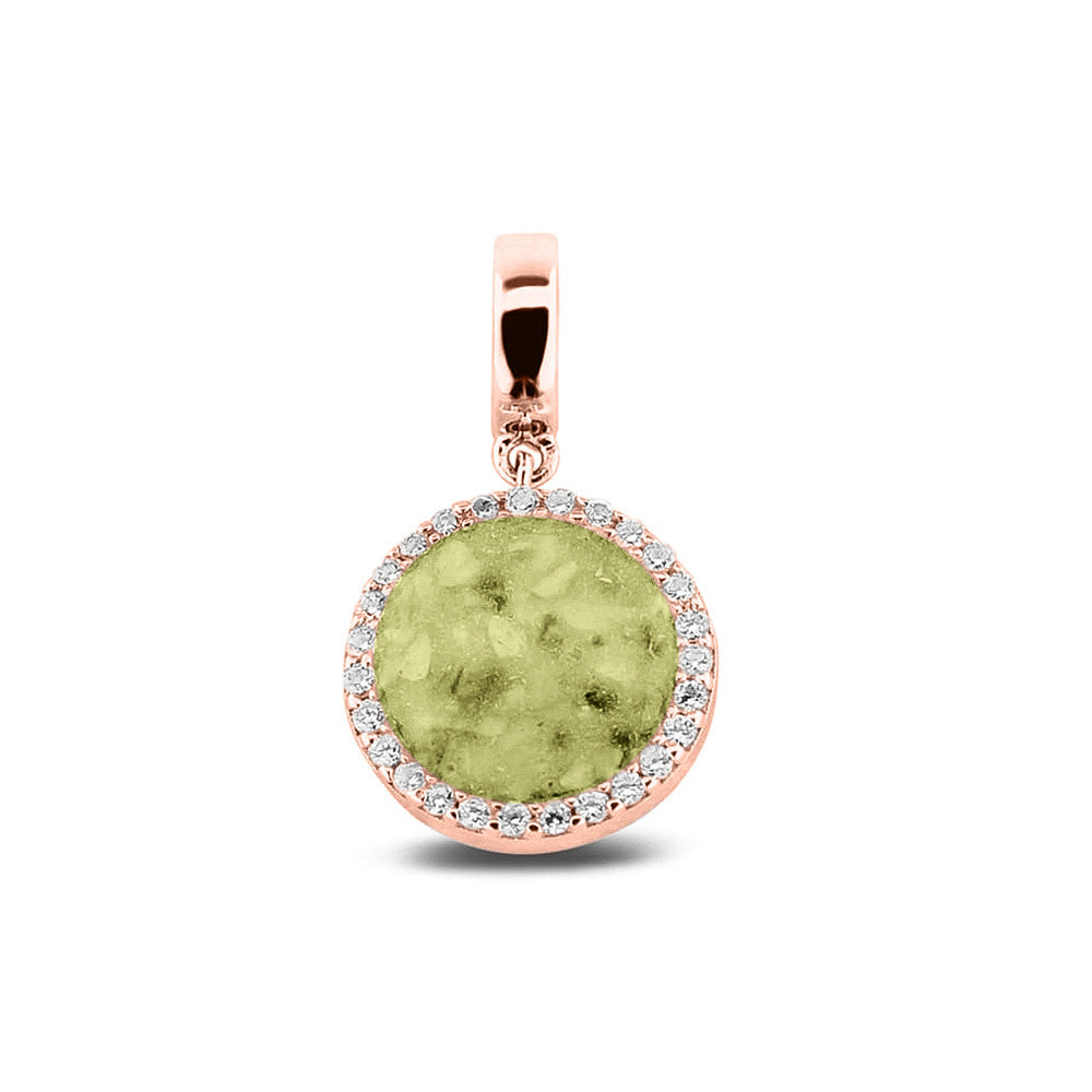 Asbedel, subtiel design rondom afgewerkt met zirkonia's  die aan de voorzijde zichtbaar gevuld wordt met as of haar met een keuze in 20 kleuren. Olive