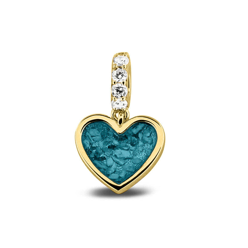 Hartvormige asbedel, het hangoog aan de buitenrand afgewerkt met zirkonia's die aan de voorzijde zichtbaar gevuld wordt met as of haar met een keuze in 20 kleuren. Turquoise
