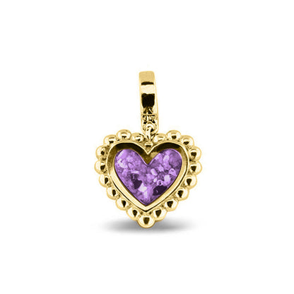 Hartvormige asbedel, die aan de voorzijde zichtbaar gevuld wordt met as of haar. Het vullen en sealen met een keuze in 20 kleuren, wordt in onze ambachtelijke edelsmederij gedaan. Purple