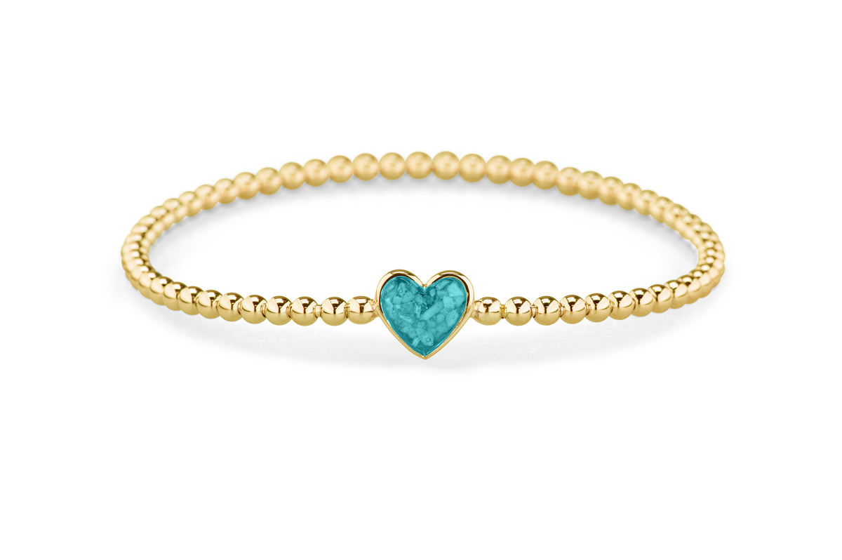 Flexibele as armband met hart als compartiment voor as of haar, gedenksieraden. Aqua