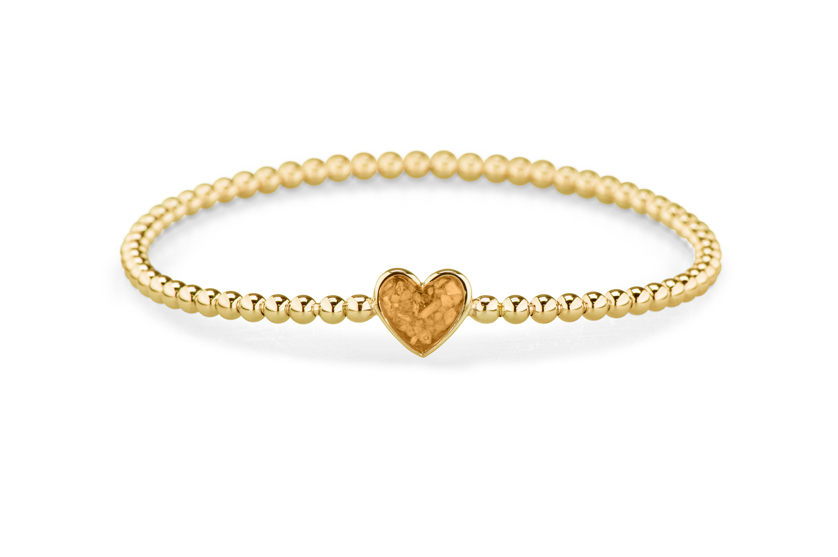 Flexibele as armband met hart als compartiment voor as of haar, gedenksieraden. Gold