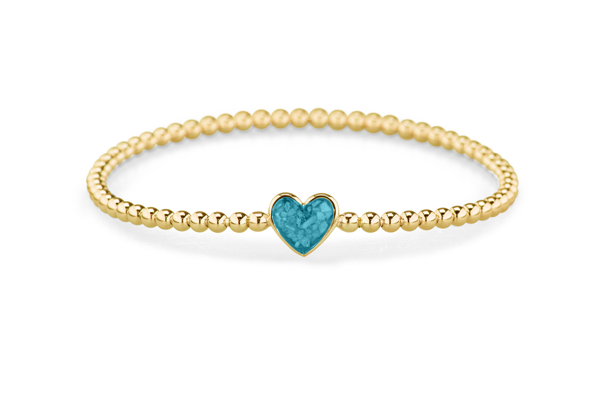 Flexibele as armband met hart als compartiment voor as of haar, gedenksieraden. turquoise