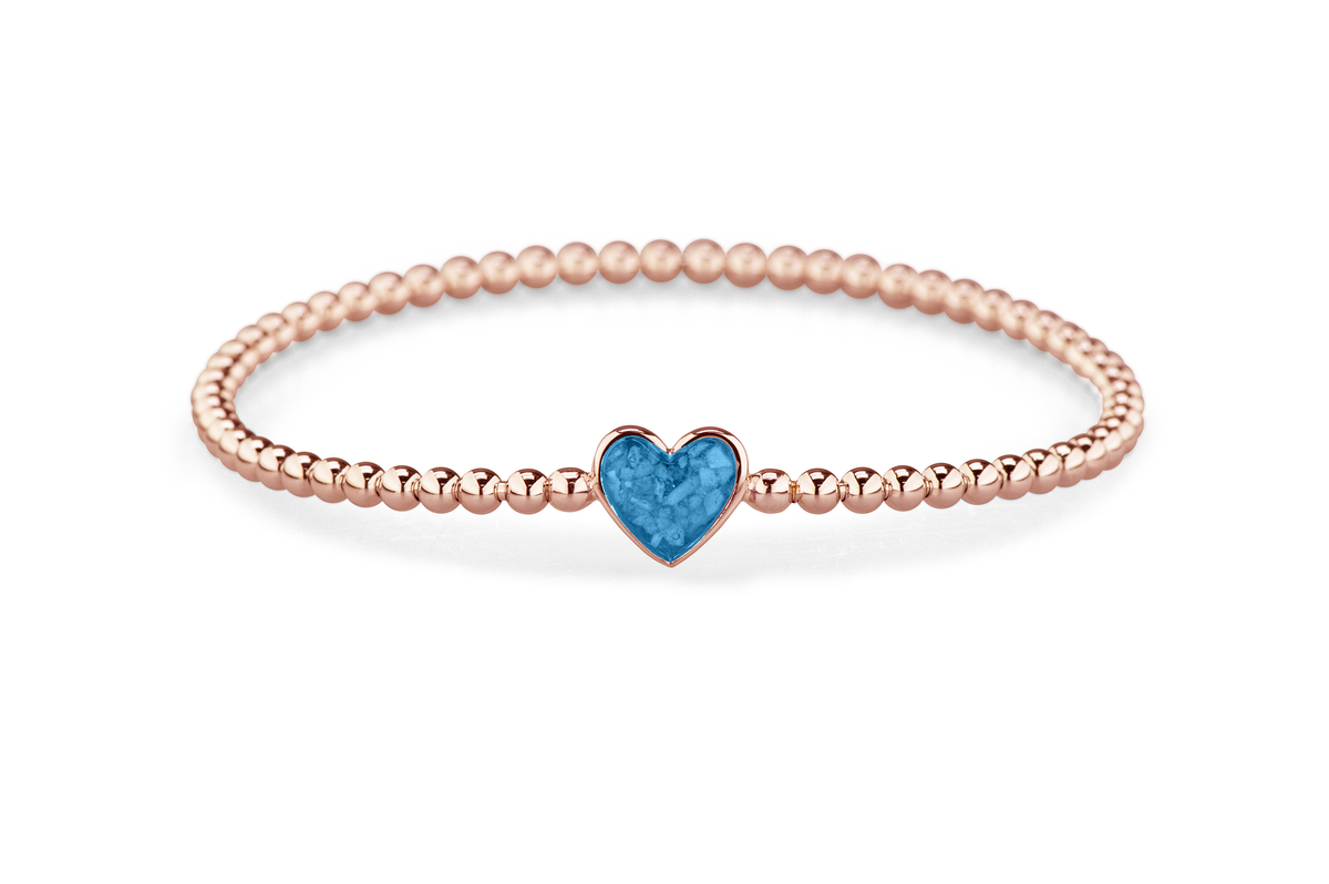 Flexibele as armband met hart als compartiment voor as of haar, gedenksieraden. Marine