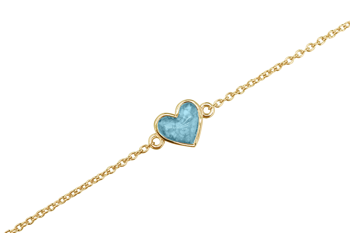 as armband met hartje als gedenksieraad. Baby