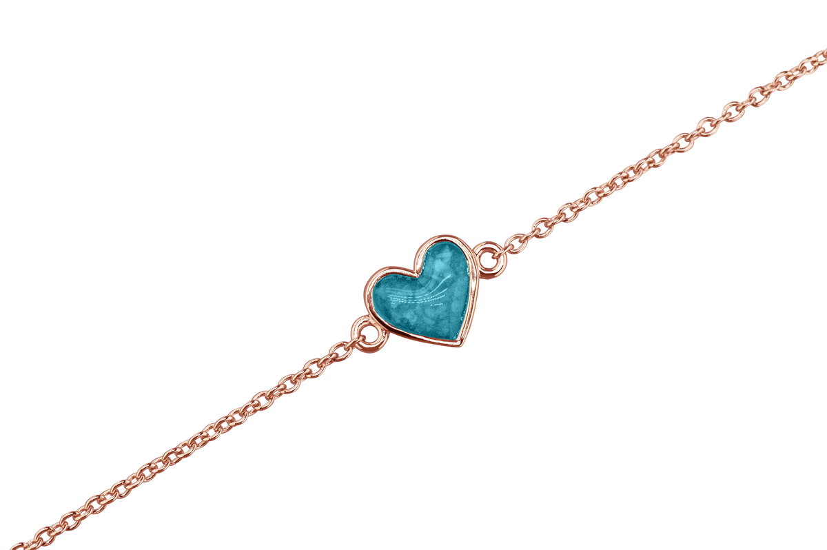 as armband met hartje als gedenksieraad. Turquoise