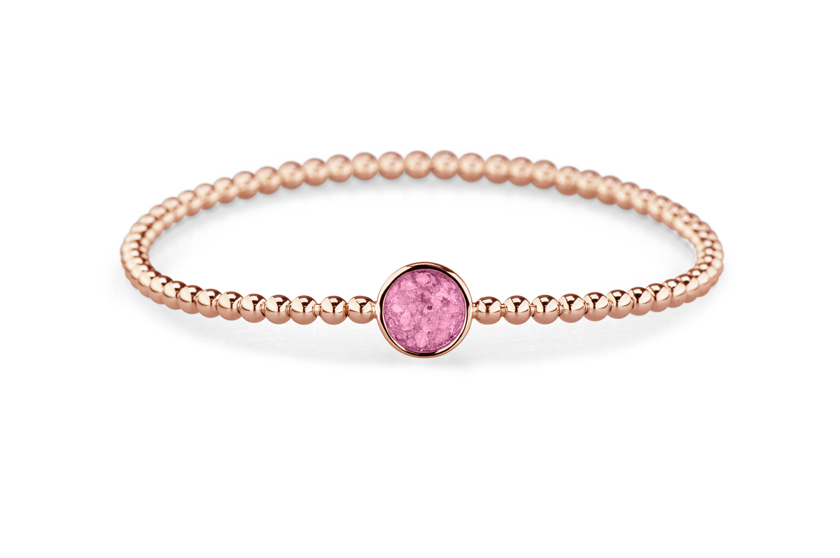 Flexibele as armband met rondje als compartiment voor as of haar, gedenksieraden. Fluo