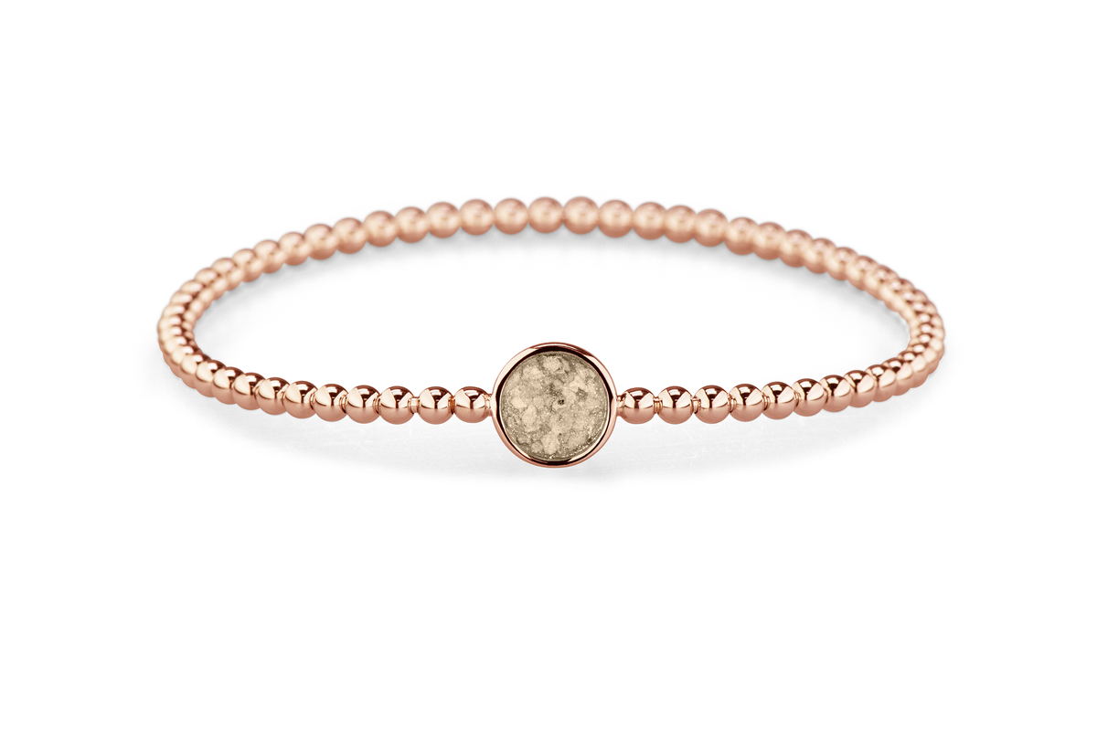 Flexibele as armband met rondje als compartiment voor as of haar, gedenksieraden. Transparent