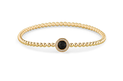 Flexibele as armband met rondje als compartiment gezet rondom met zirconia's voor as of haar. Black