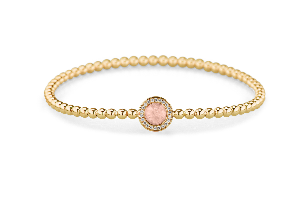 Flexibele as armband met rondje als compartiment gezet rondom met zirconia's voor as of haar. Blush
