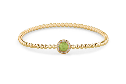 Flexibele as armband met rondje als compartiment gezet rondom met zirconia's voor as of haar. Green