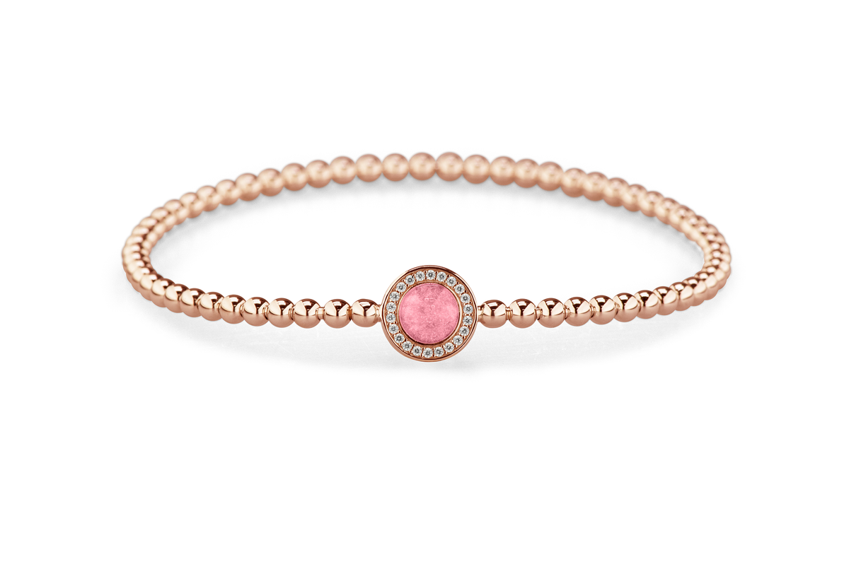 Flexibele as armband met rondje als compartiment gezet rondom met zirconia's voor as of haar. Soft