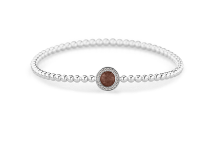 Flexibele as armband met rondje als compartiment gezet rondom met zirconia's voor as of haar. Brown