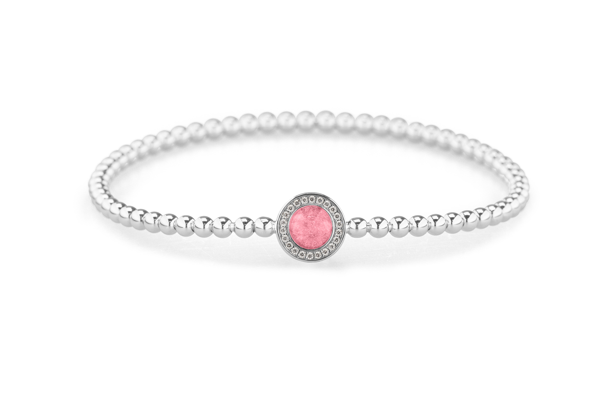 Flexibele as armband met rondje als compartiment gezet rondom met zirconia's voor as of haar. Soft