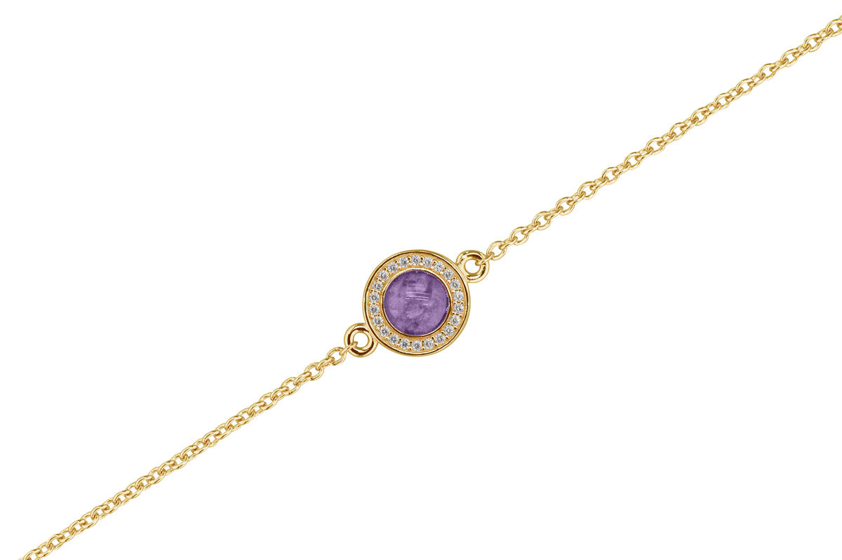 As armband met rondje als compartiment in het midden aan de voorzijde. Purple
