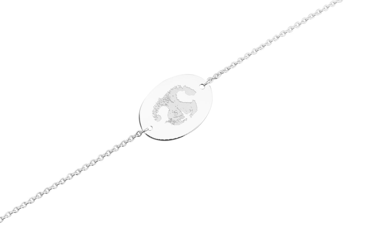 Armband met gebogen plaatje voor gravure. Tekst  witgoud