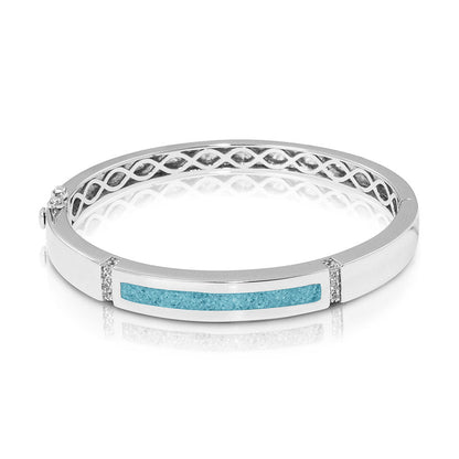 Zilveren as armband die gevuld kan worden met as of haar. Baby