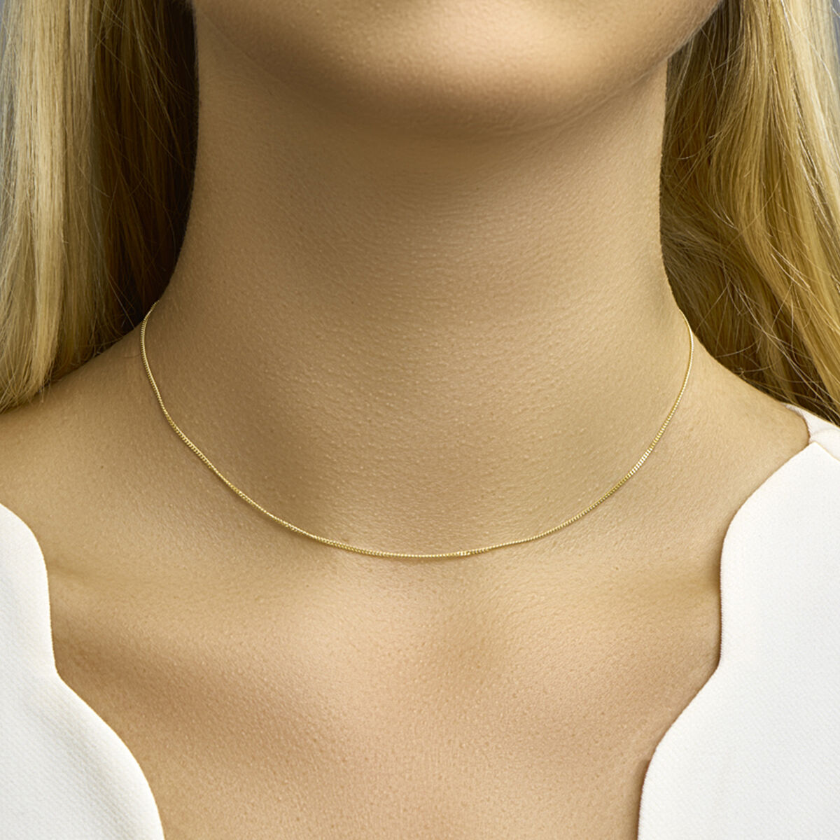 Collier gourmette geelgoud