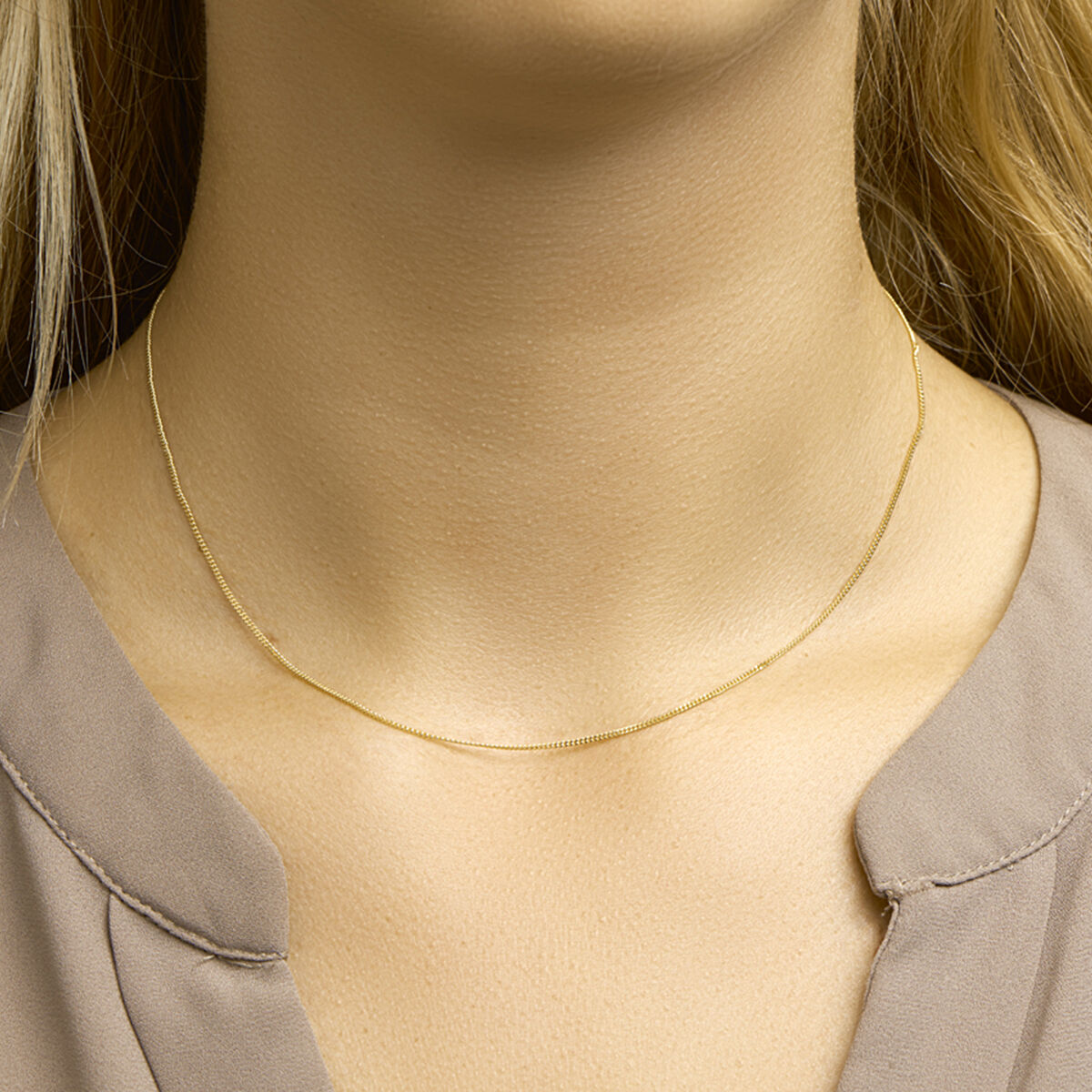 Collier gourmette geelgoud