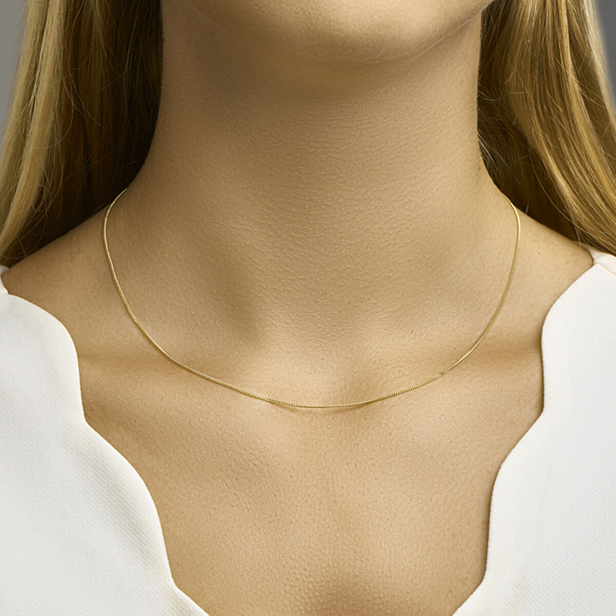 Collier gourmette geelgoud