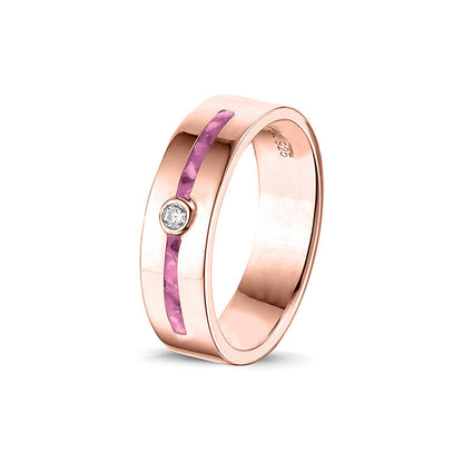 Asring 5 mm uit onze serie gedenksieraden, waar zichtbaar as of haar verwerkt wordt in twee separate compartimenten met in het midden een zirkonia of diamant naar keuze. Fluo