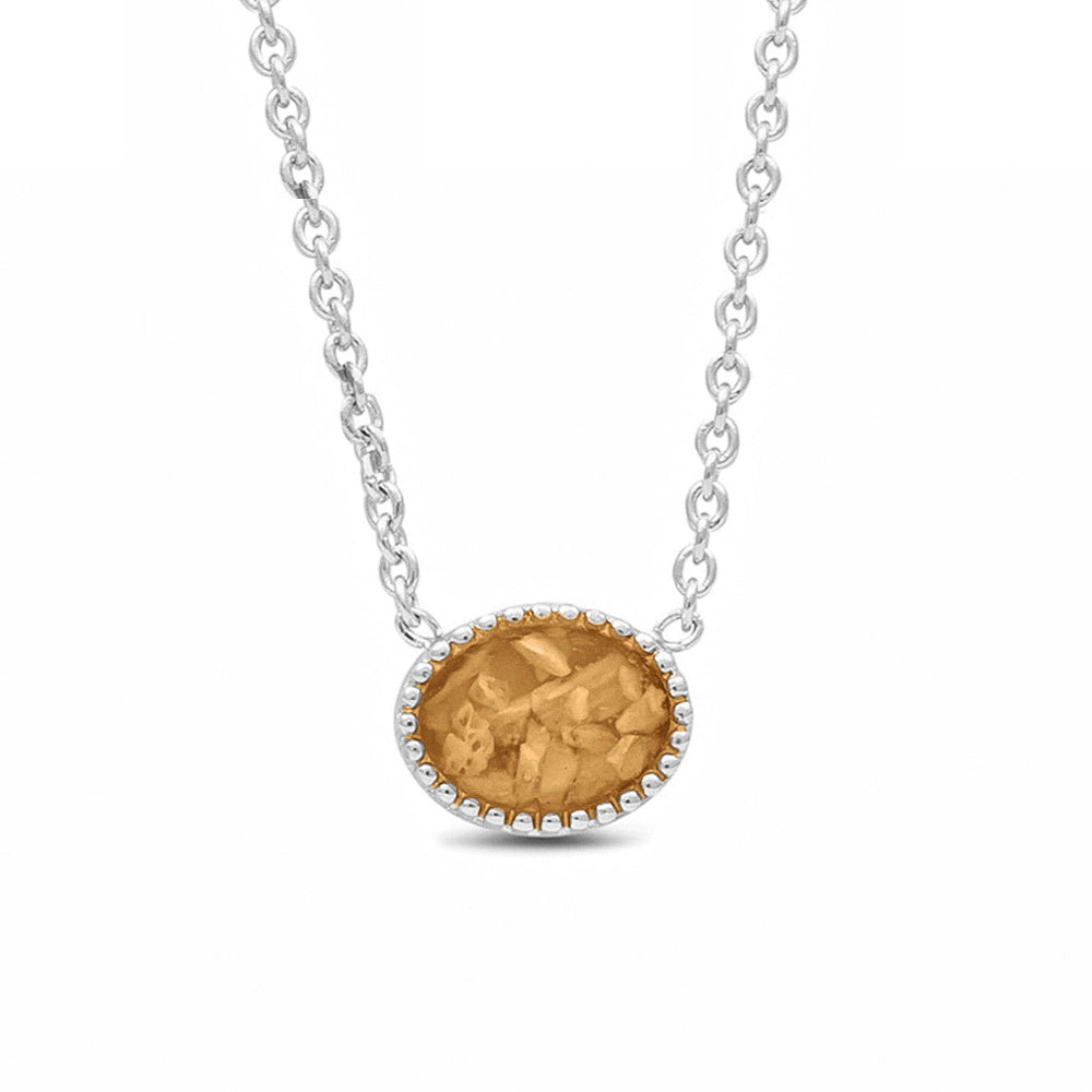 Ashanger, gedenksieraad, waar as en haar in verwerkt wordt. Gold