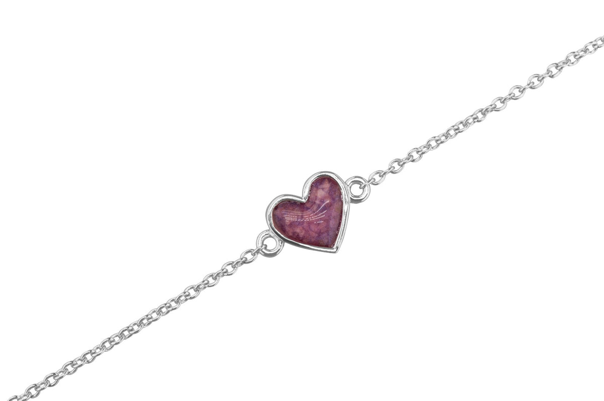 as armband met hartje als gedenksieraad. Blue