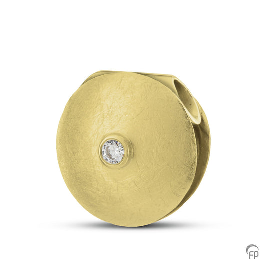 Hanger met in het midden een edelsteen in zilver uitgevoerd met zirkonia, in goud met diamant. De ashangers uit deze collectie gedenksieraden zijn zeer gevarieerd en eigentijds ontworpen.