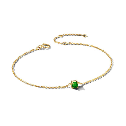 Exclusieve 14 KT geelgouden anker armband met geboortesteen in chatonzetting.