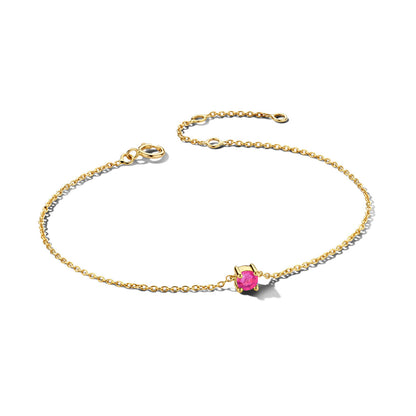 Exclusieve 14 KT geelgouden anker armband met geboortesteen in chatonzetting.