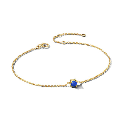 Exclusieve 14 KT geelgouden anker armband met geboortesteen in chatonzetting.